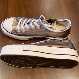 Gold Converse tennis shoes